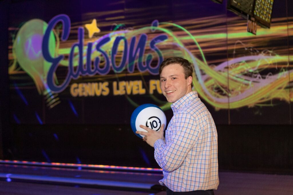 man about to throw a bowling ball at edisons